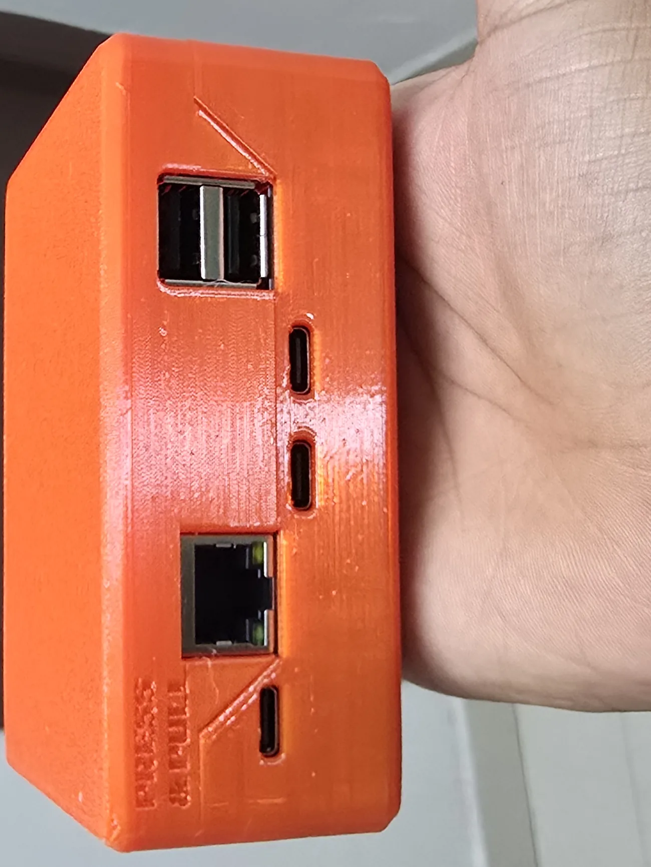 The port face of the SK-01 prototype: USB-A, two USB-C, and Ethernet.